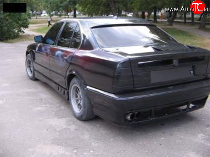 4 999 р. Накладка на задний бампер Rieger BMW 5 серия E34 седан дорестайлинг (1988-1994)  с доставкой в г. Санкт‑Петербург