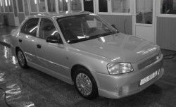 5 699 р. Передний бампер Classic Style  Hyundai Accent  седан ТагАЗ (2001-2012) (Неокрашенный)  с доставкой в г. Санкт‑Петербург. Увеличить фотографию 1