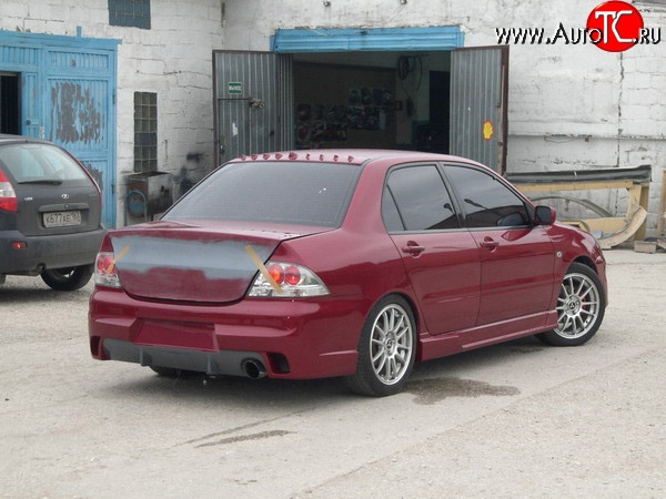 14 299 р. Задний бампер Evo Mitsubishi Lancer 9 1-ый рестайлинг седан (2003-2005) (Неокрашенный)  с доставкой в г. Санкт‑Петербург