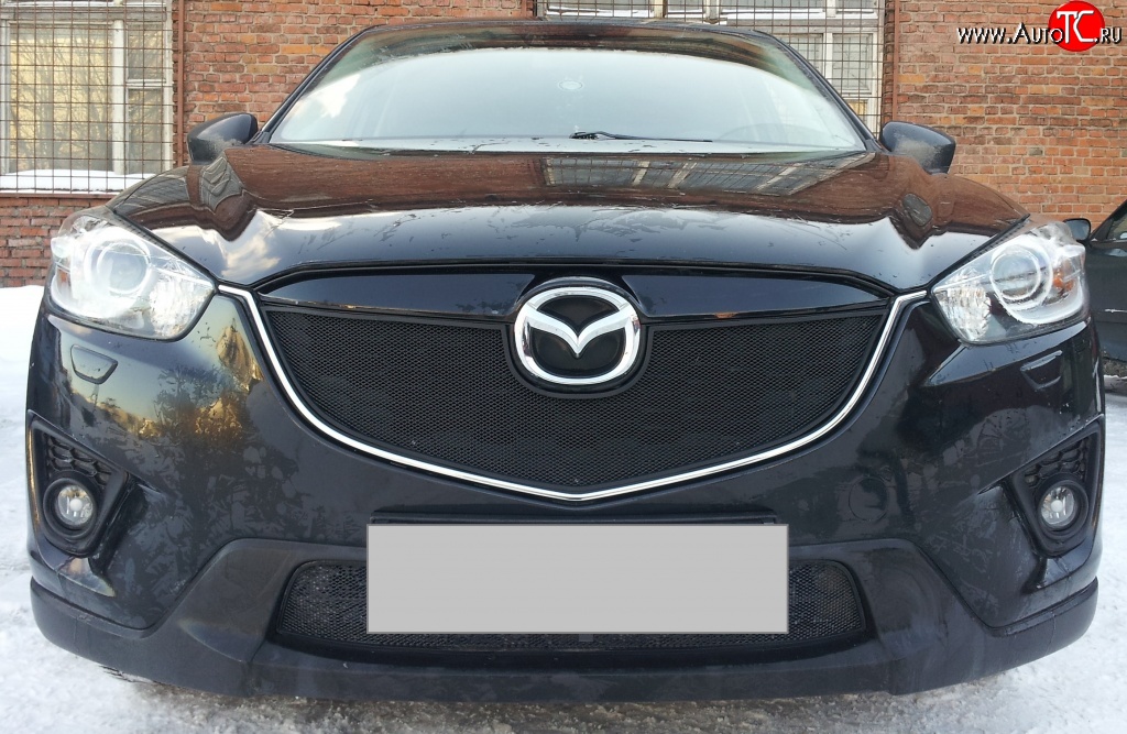 2 299 р. Нижняя сетка на бампер Russtal (черная) Mazda CX-5 KE дорестайлинг (2011-2014)  с доставкой в г. Санкт‑Петербург