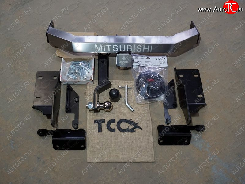 24 399 р. Фаркоп (тягово-сцепное устройство) без заднего бампера TCC  Mitsubishi L200  5 KK,KL (2015-2022) дорестайлинг, рестайлинг (оцинкованный, шар Е, усиленный, надпись Mitsubishi)  с доставкой в г. Санкт‑Петербург