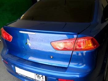 3 899 р. Лип спойлер Элегант Mitsubishi Lancer 10 седан дорестайлинг (2007-2010) (Неокрашенный)  с доставкой в г. Санкт‑Петербург. Увеличить фотографию 2