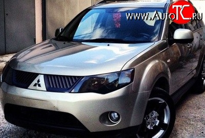 1 529 р. Темная защита передних фар SIM Mitsubishi Outlander XL (CW)  дорестайлинг (2005-2009)  с доставкой в г. Санкт‑Петербург