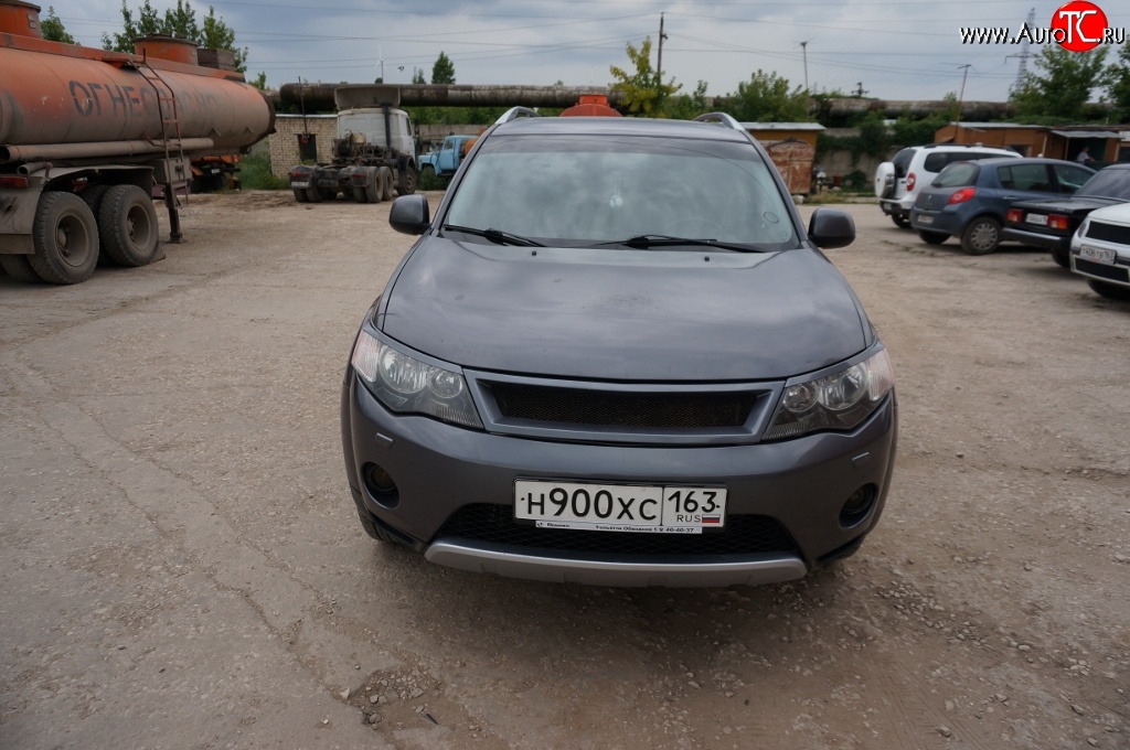 5 449 р. Решётка радиатора (рестайлинг) Sport Mitsubishi Outlander XL (CW)  рестайлинг (2010-2013) (Неокрашенная)  с доставкой в г. Санкт‑Петербург