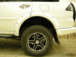 15 349 р. Накладки на колёсные арки BUSHWACKER Mitsubishi Pajero Sport PB дорестайлинг (2008-2013) (Неокрашенные)  с доставкой в г. Санкт‑Петербург. Увеличить фотографию 3