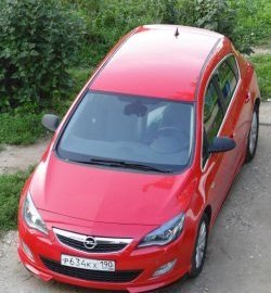 3 999 р. Накладка Sport на передний бампер Opel Astra J хэтчбек 5 дв.  рестайлинг (2012-2017) (Неокрашенная)  с доставкой в г. Санкт‑Петербург. Увеличить фотографию 2