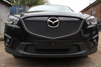 799 р. Зимняя заглушка решетки радиатора (с парктроником) PREMIUM Стрелка11  Mazda CX-5  KE (2011-2014) дорестайлинг (черная)  с доставкой в г. Санкт‑Петербург. Увеличить фотографию 2